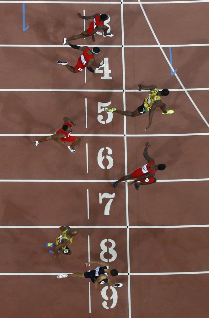USain Bolt campeon 100 metros Beijing locos por correr 16