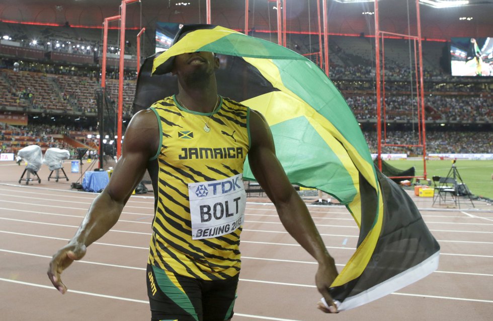 USain Bolt campeon 100 metros Beijing locos por correr 23